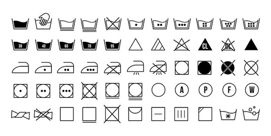 Guide: Så tolkar du tvättsymboler på kläder