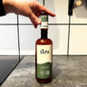 Naturlig såpspray, doft av enträ, och en refill flaska. 